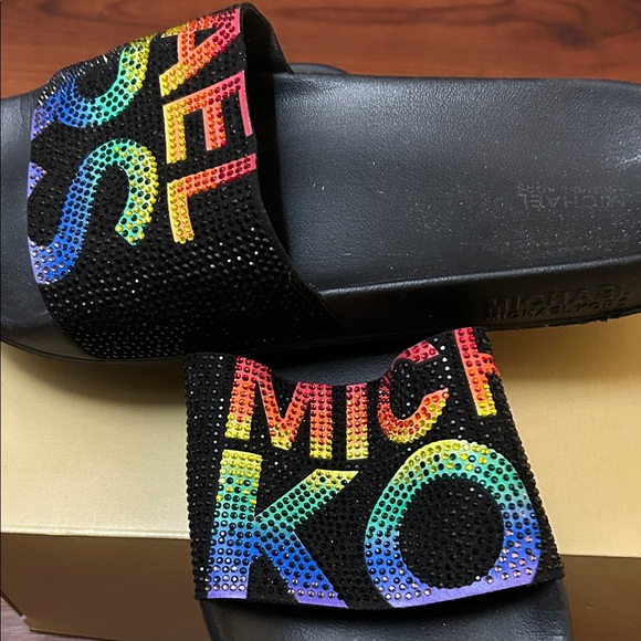 Michael Kors Shoes - Michael Kors Black Slides with Rainbow Crystal Logo